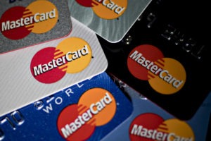 Выгоднее пользоваться картами Mastercard, так как конвертация идет через евро